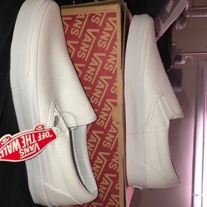 classic white slip on vans.